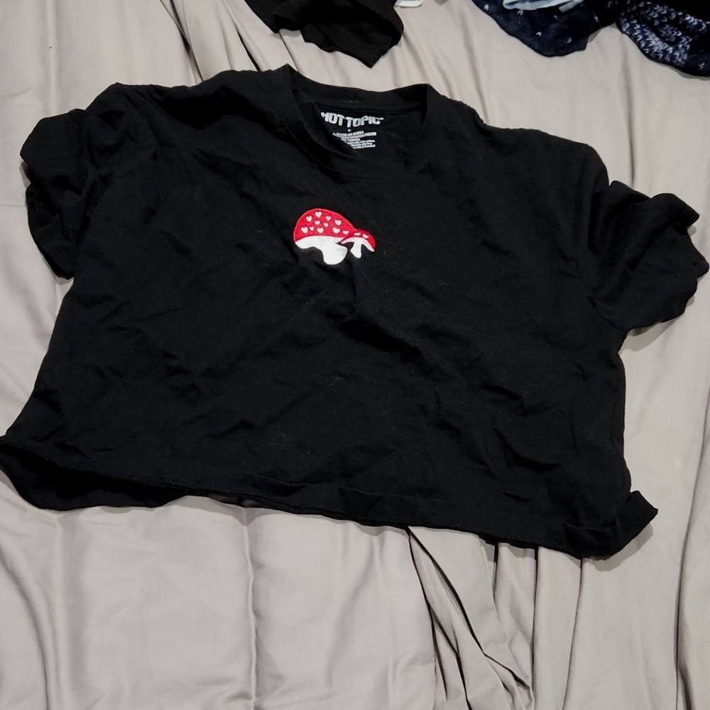 Black shirt with mushroom on it